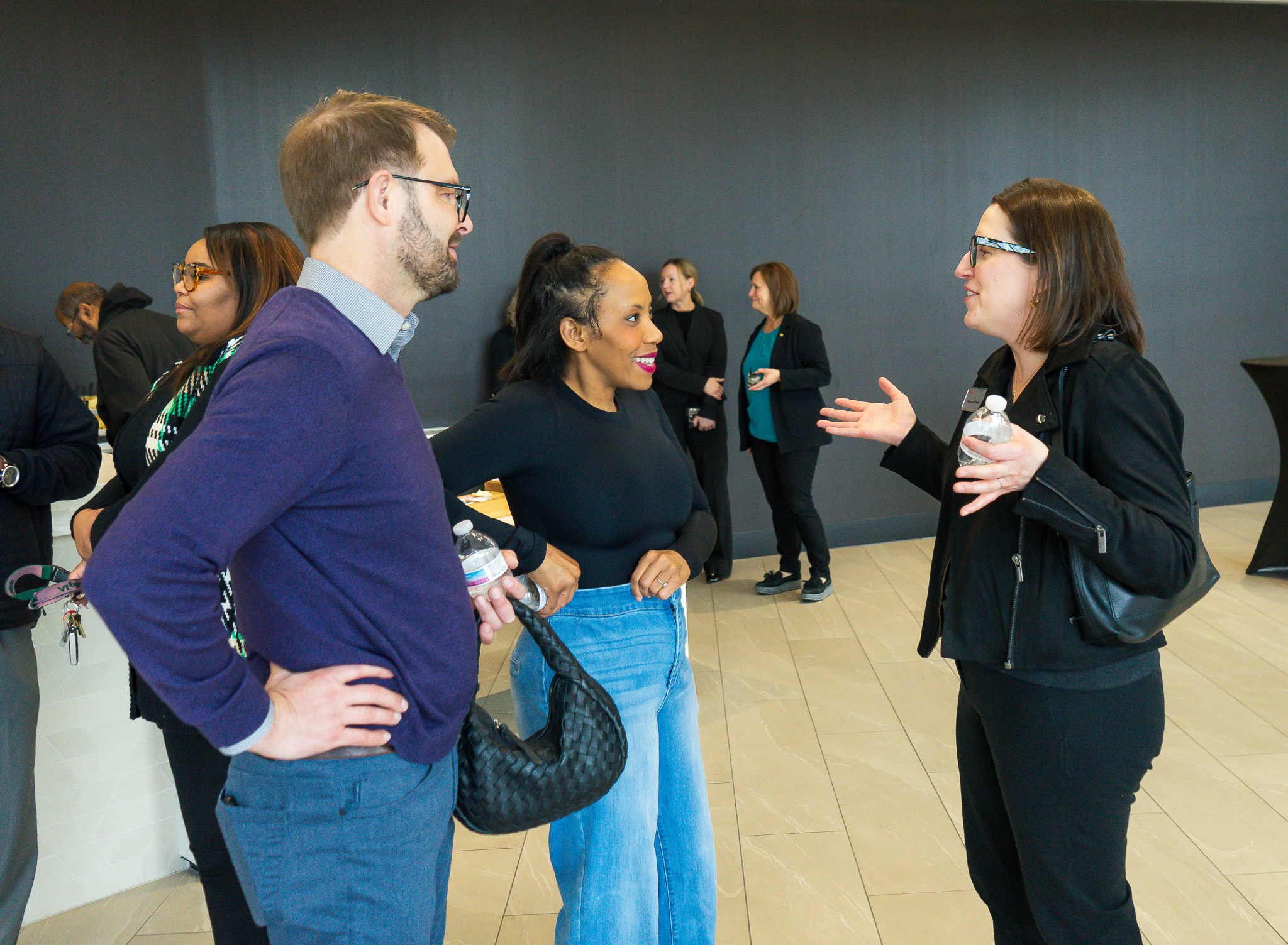 Community members talking together at a Foundation gathering