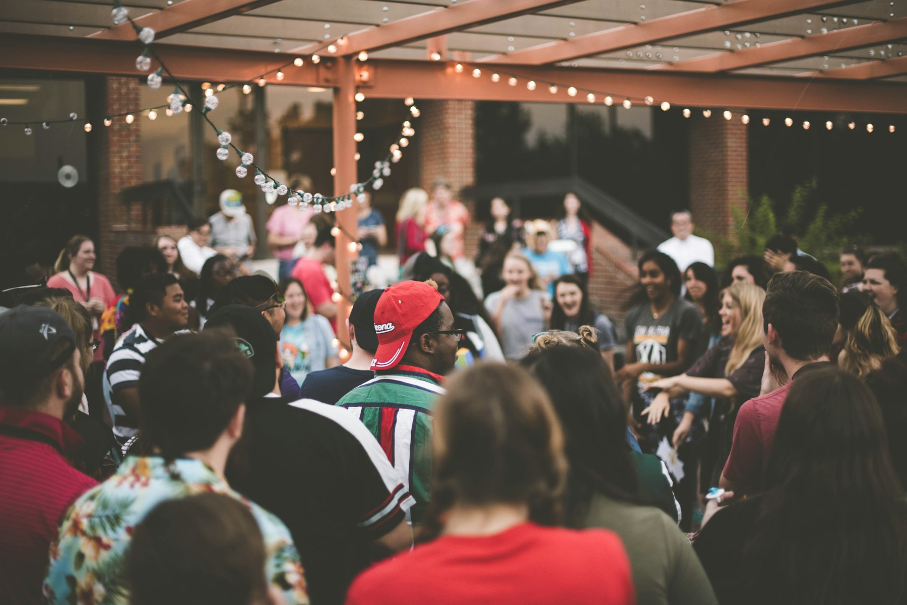 Community members gathered in conversation at a local event