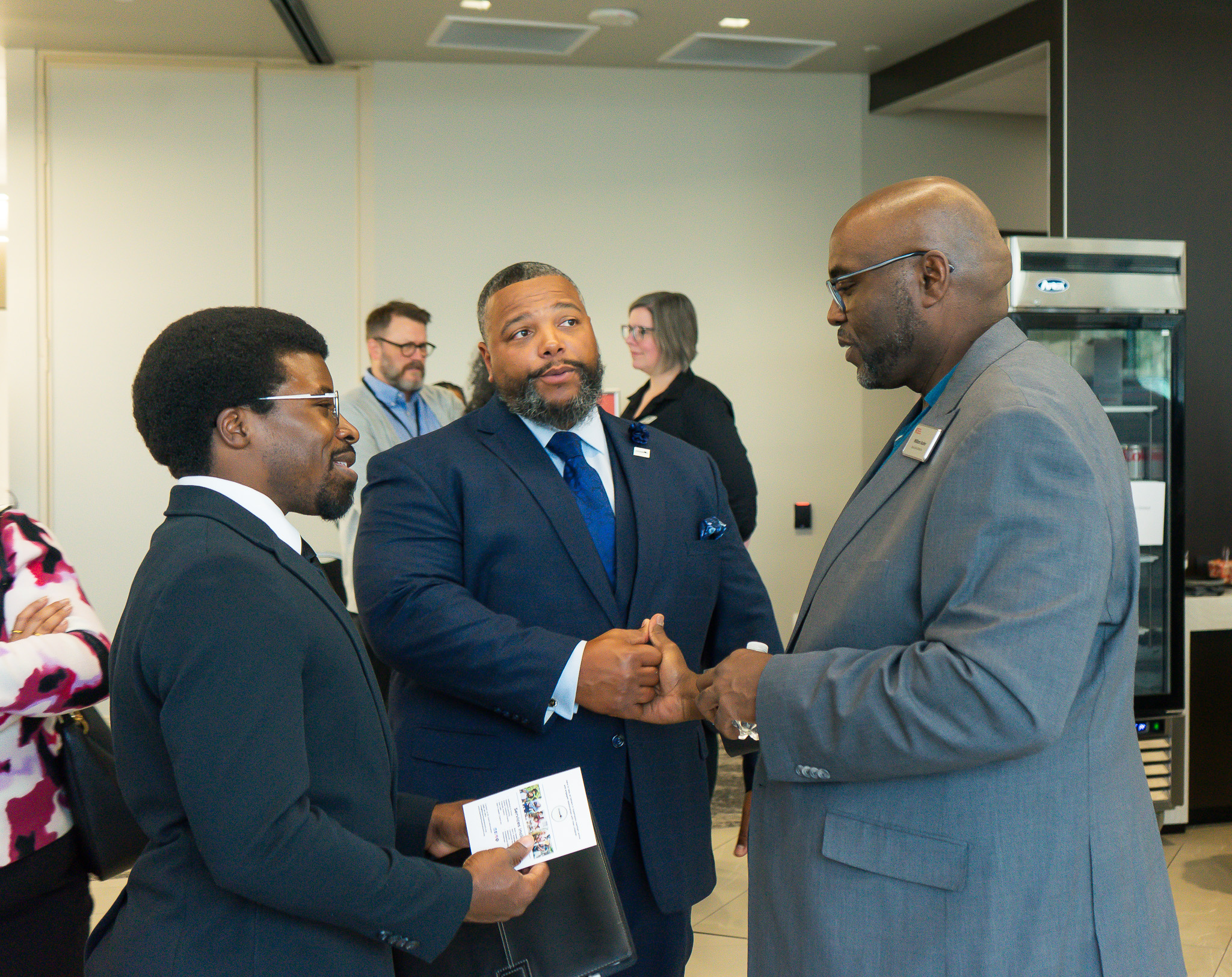 Community leaders in conversation at a Stryker Johnston Foundation gathering